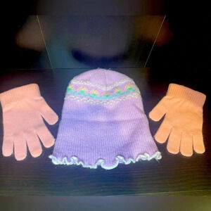 1990s purple hat with floral detail and pink gloves!
